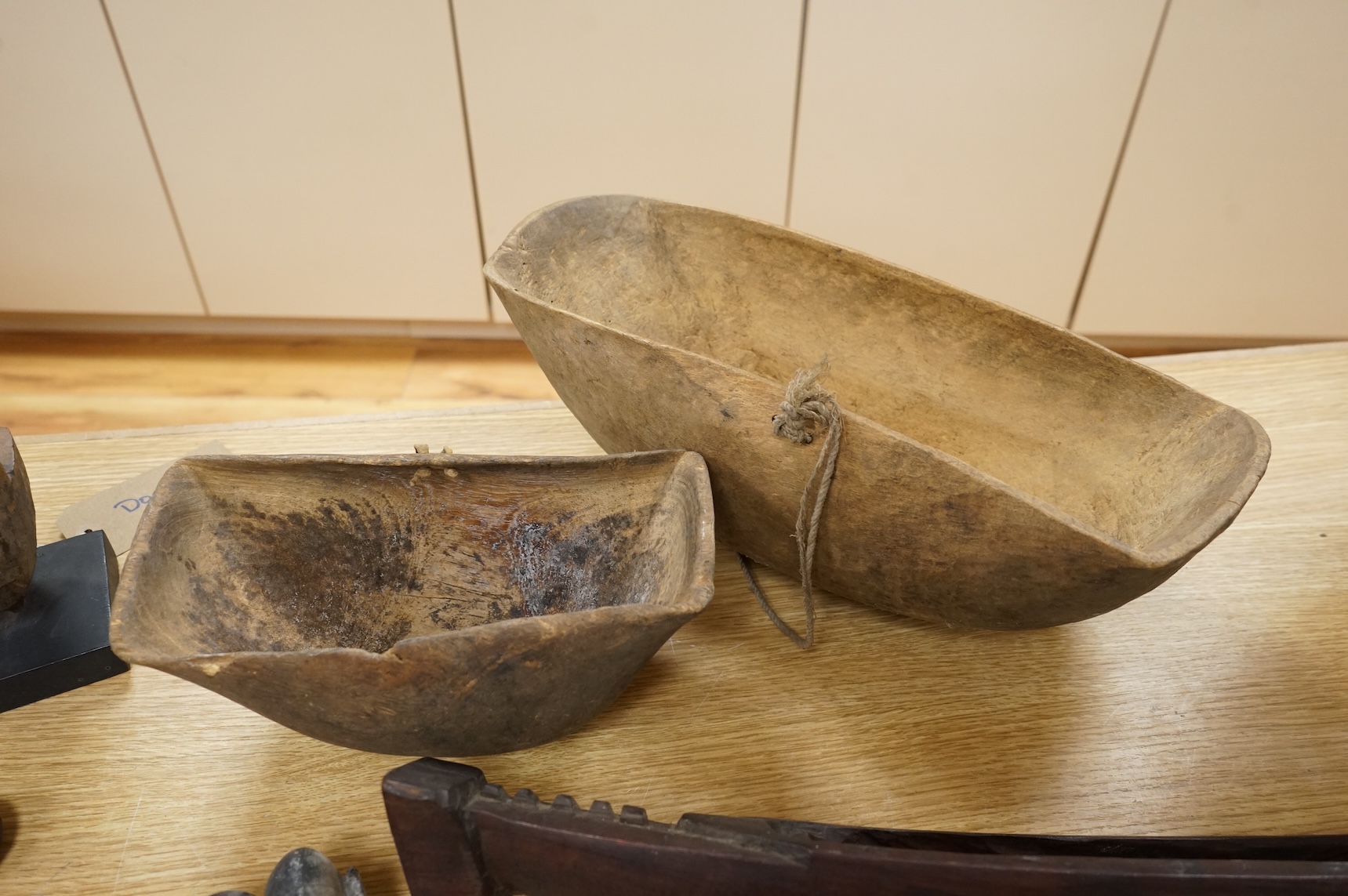 Tribal interest; A collection of various African carvings, a basket and spear